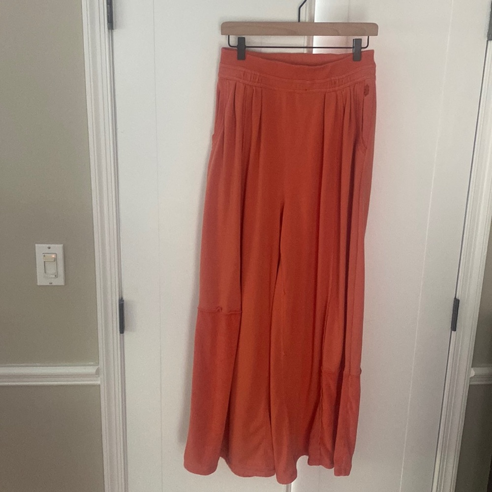 FreePeople “movement “orange wide leg sweat pant . Size medium